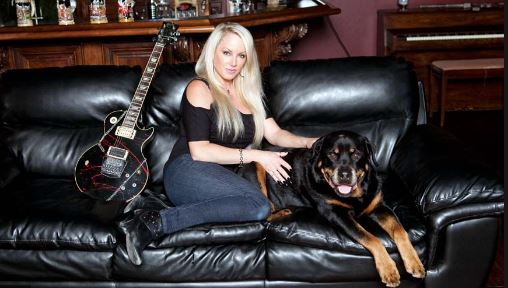 kathryn hanneman with jeff's first guitar & family dog