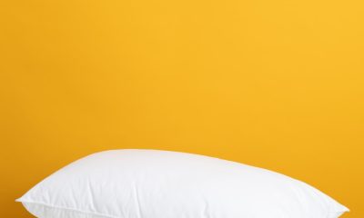 white pillow on white bed