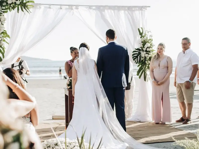 newly wed couple on isle getting married at shore