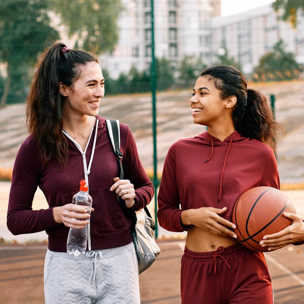 women walking home after basketball game 23 2148773270