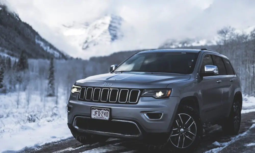 gray Jeep SUV parked on road