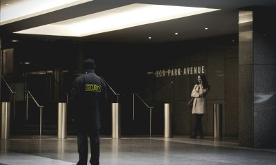 security guard standing on the gray floor