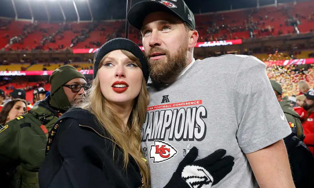 Taylor Swift celebrates with Travis Kelce 87 of the Kansas City Chiefs after defeating the Buffalo B