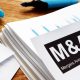 bigstock documents about mergers and acquisitions 279664360 scaled