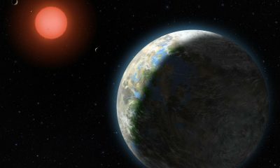exoplanet with clouds orbiting red dwarf