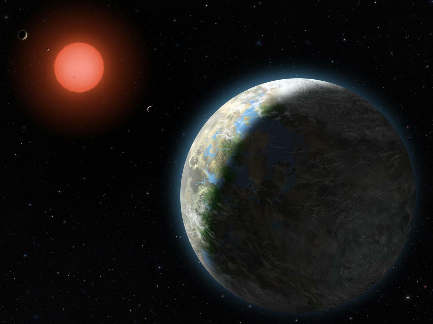 exoplanet with clouds orbiting red dwarf