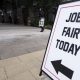 INV JobFairSign GettyImages 2021277707 6c537765b6174cecb9659e369b6cd610