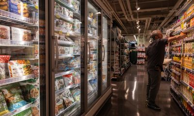 Whole Foods aisle shelves Bloomberg scaled