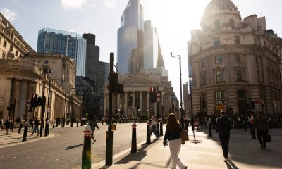 commuters pass bank of england and royal exchange bloomberg scaled