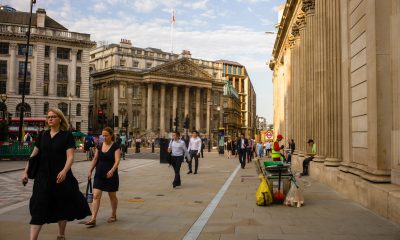 commuters pass bank of england bloomberg scaled