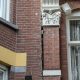 crack between residential buildings in amsterdam bloomberg scaled