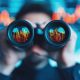 investor with binoculars for strategic opportunity 1067159406 AdobeStock scaled