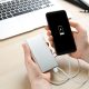 mobile phone with power bank 335417612 AdobeStock scaled