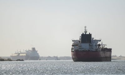 ship transits suez canal towards red sea getty scaled