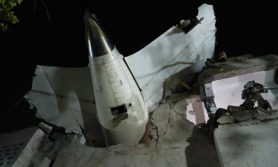 tail of air india flight 171 at crash site in ahmedabad bloomberg scaled