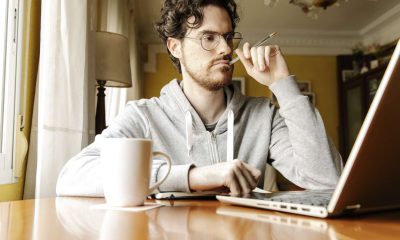 Man looking at laptop for credit counseling fcb00ff589c94743887f687cb107c19e
