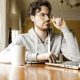 Man looking at laptop for credit counseling fcb00ff589c94743887f687cb107c19e