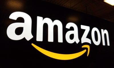amazon logo on black wall 190121941 bigstock scaled