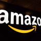 amazon logo on black wall 190121941 bigstock scaled