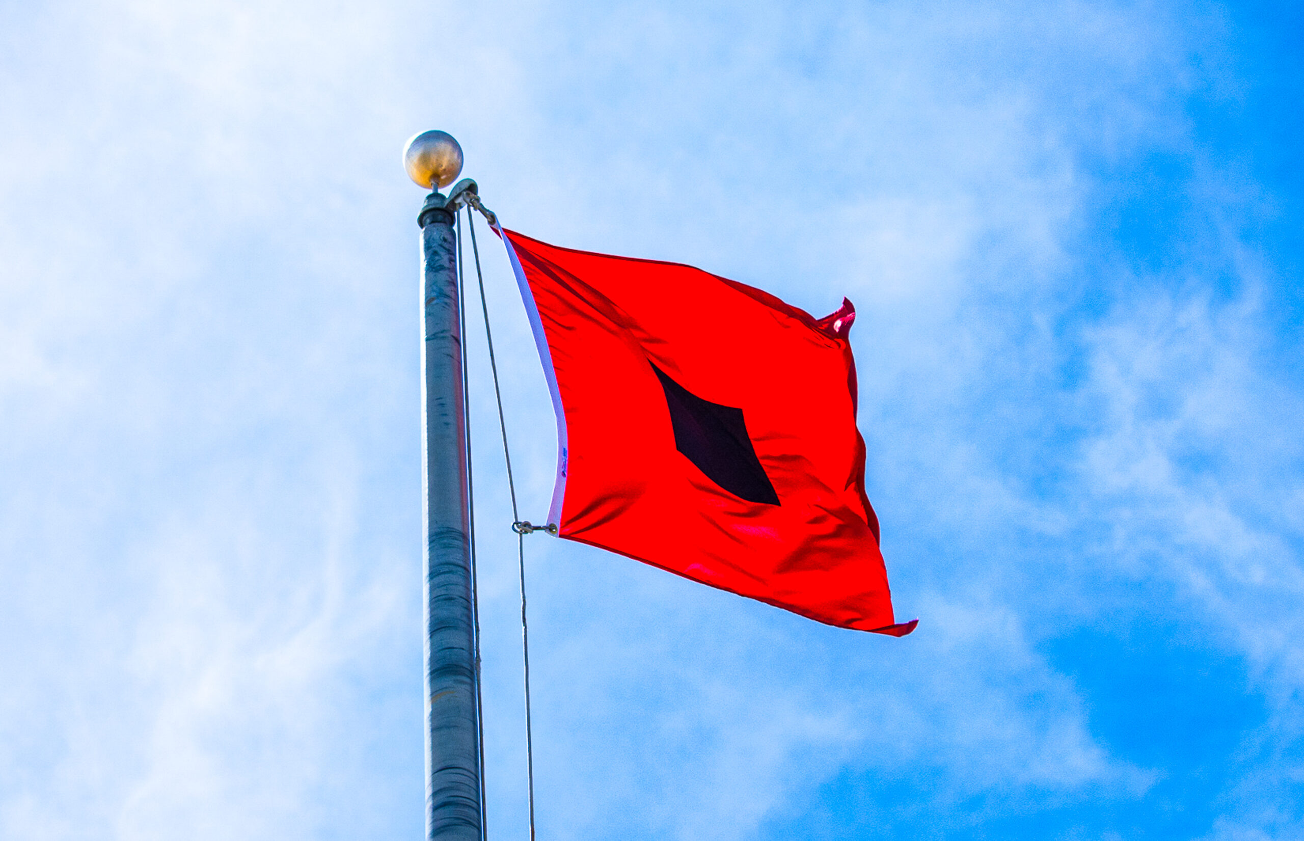 hurricane storm warning flag AdobeStock scaled