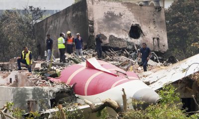 officials inspect site of air India crash AP scaled
