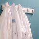 nhs logo on laboratory coats bloomberg scaled