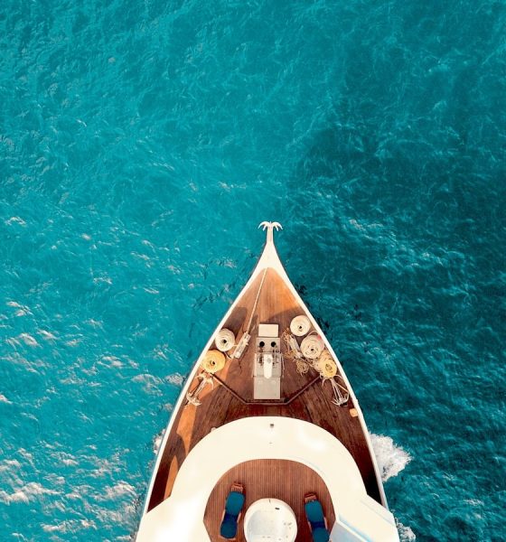 birds eye photography of boat on body of water
